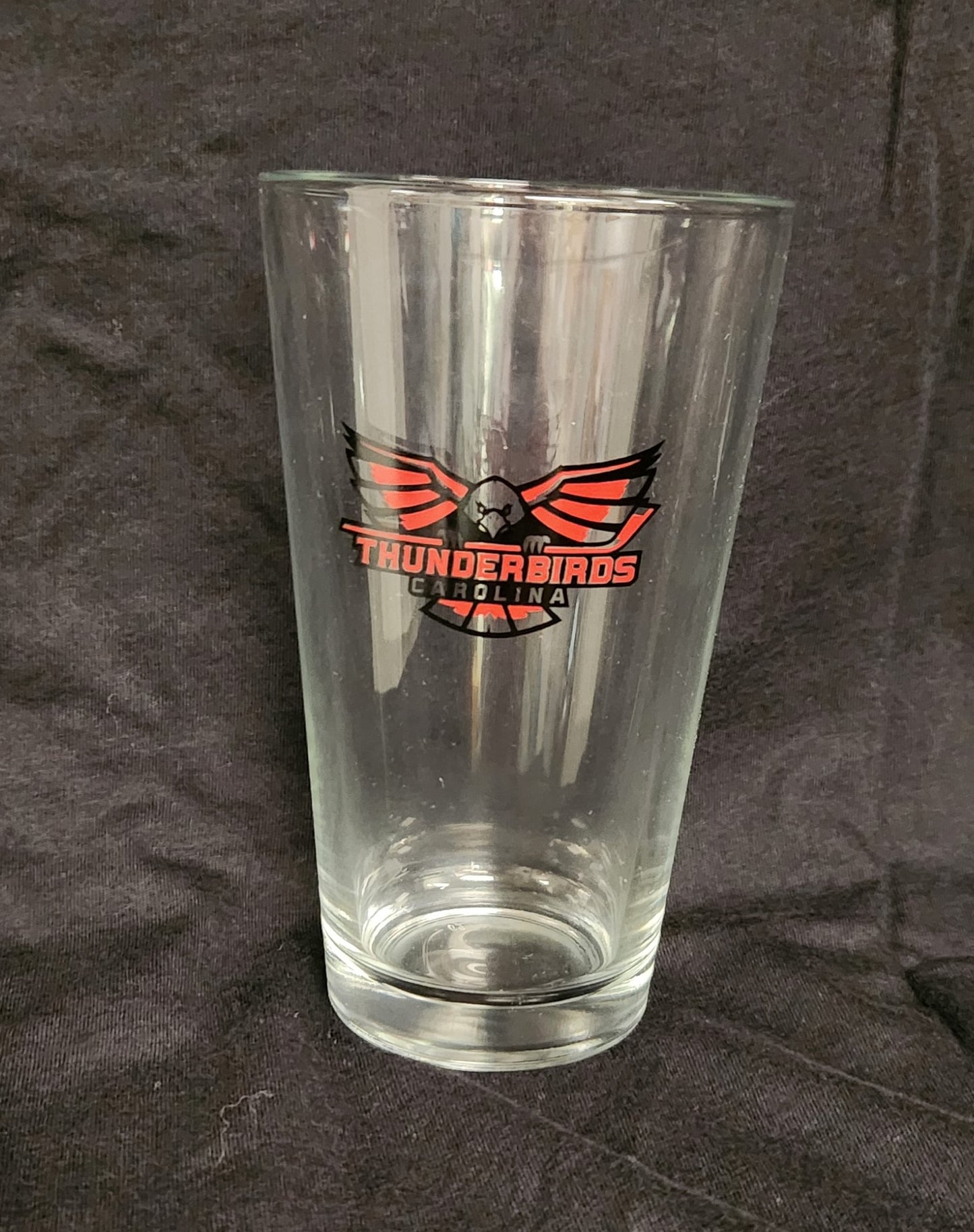 Pint glass with Thunderbirds Logo