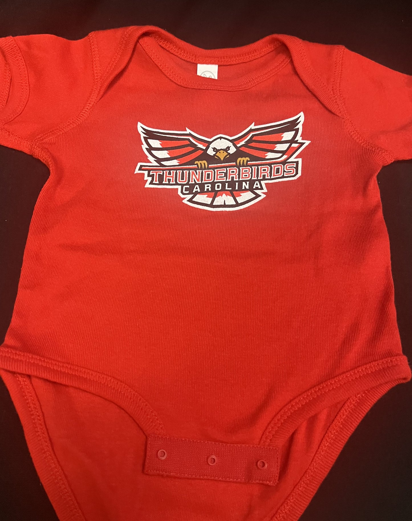 6 month old short sleeve w/Thunderbird Logo Black or Red